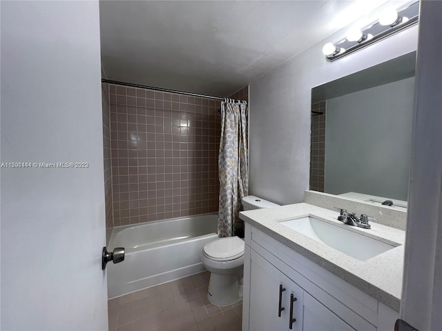 full bathroom with tile patterned flooring, vanity, shower / tub combo with curtain, and toilet