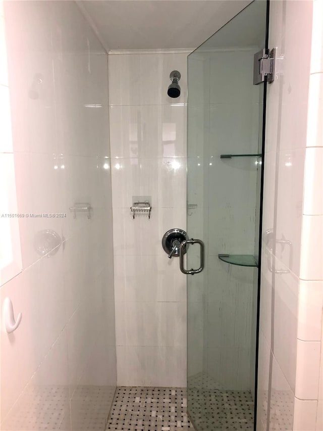 bathroom with an enclosed shower