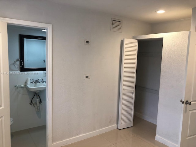 9633 SW 20th Ter Unit 9633, Miami, FL 33165 - corridor featuring light tile patterned floors and baseboards
