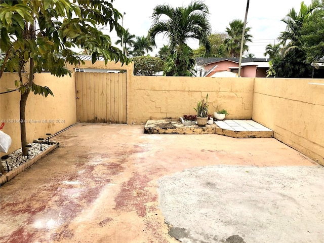 9633 SW 20th Ter Unit 9633, Miami, FL 33165 - view of yard with fence and a patio area