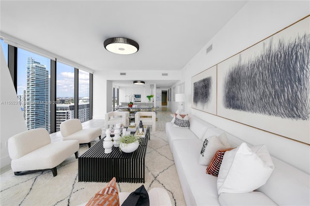 living room with a wall of windows