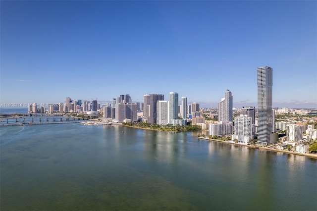 property's view of city featuring a water view