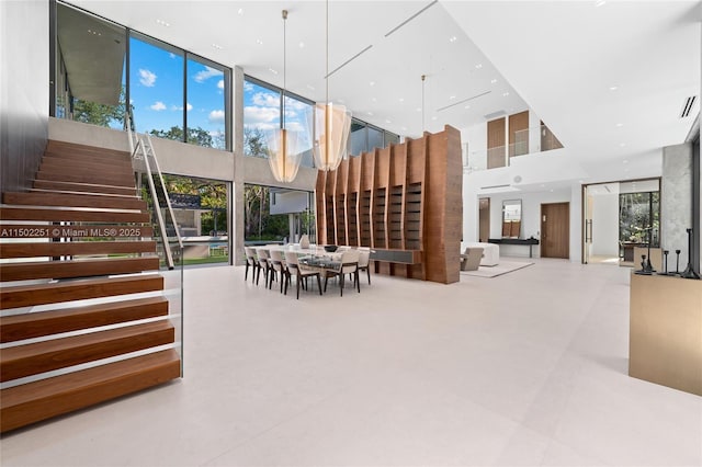 5245 Oak Ln, Coral Gables, FL 33156 - community lobby featuring a towering ceiling, expansive windows, and stairway