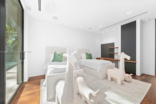 5245 Oak Ln, Coral Gables, FL 33156 - bedroom featuring wood finished floors and recessed lighting