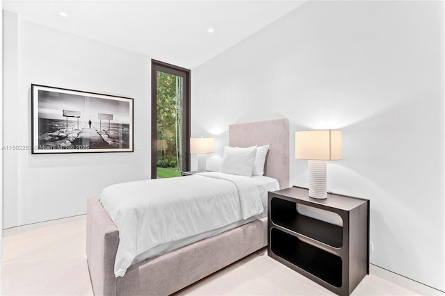 bedroom featuring vaulted ceiling