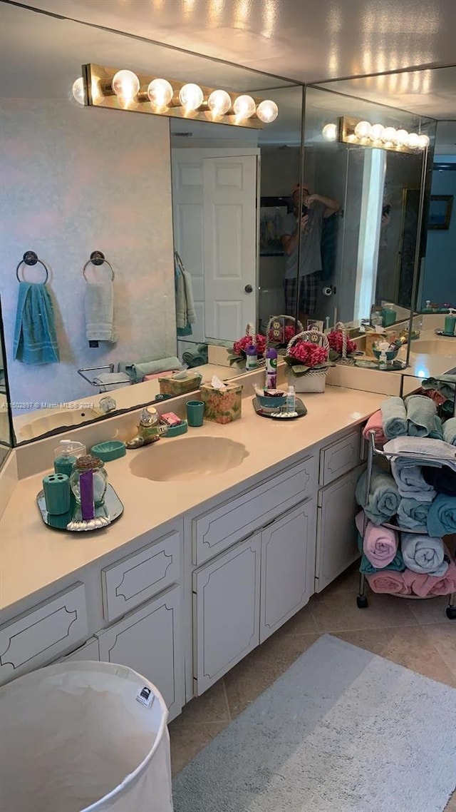 bathroom with vanity and tile patterned floors