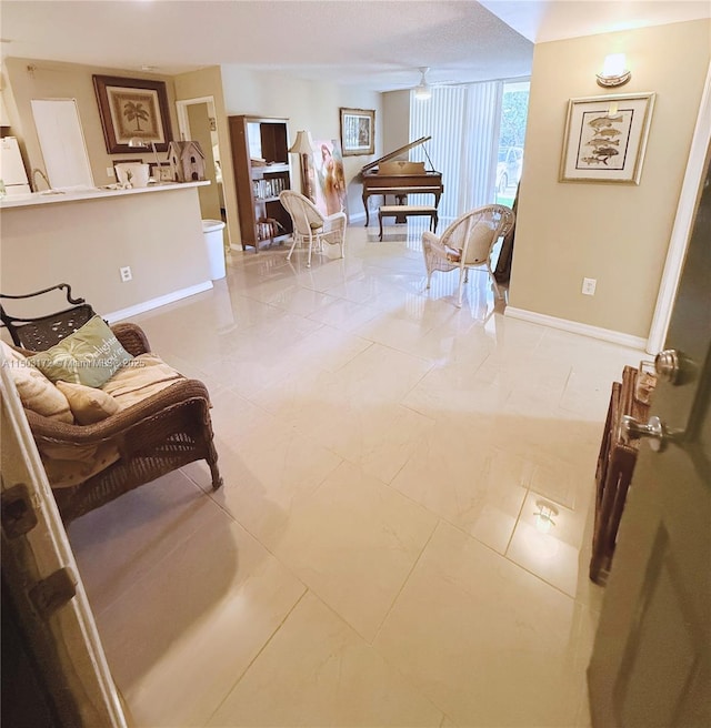 living room featuring baseboards