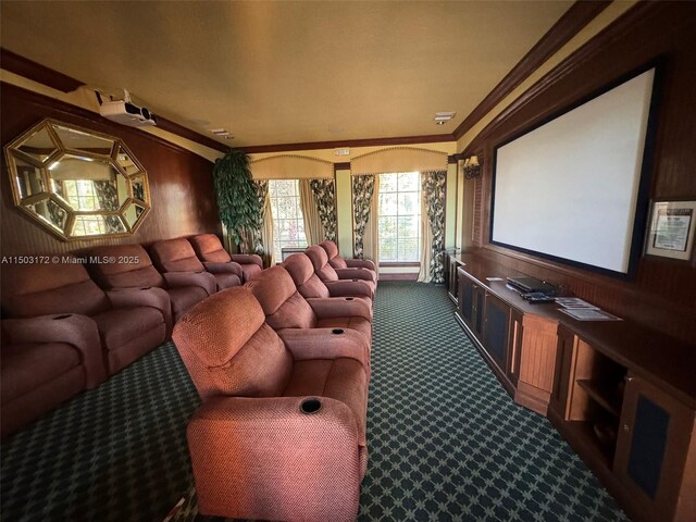 interior space with built in desk, carpet floors, and ornamental molding