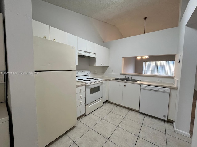 kitchen with sink, white cabinets, white appliances, and light tile patterned floors