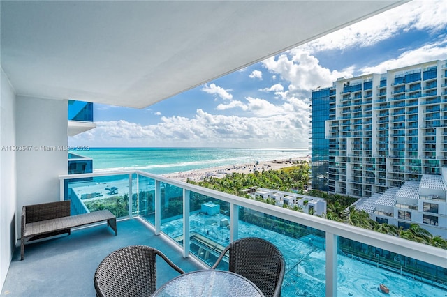 balcony featuring a water view