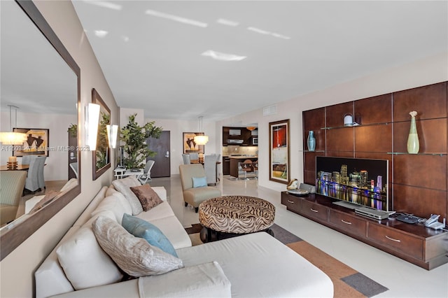 living room featuring light tile patterned flooring