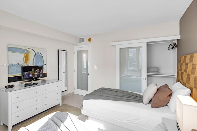 bedroom featuring light hardwood / wood-style floors