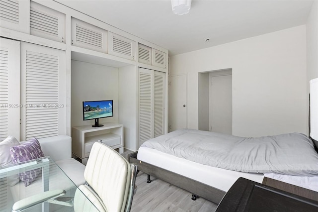 bedroom featuring light hardwood / wood-style floors