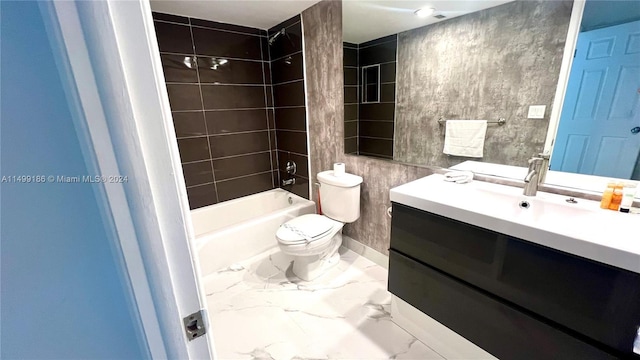 full bathroom featuring tiled shower / bath combo, vanity, and toilet