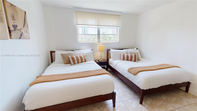 bedroom with tile patterned flooring