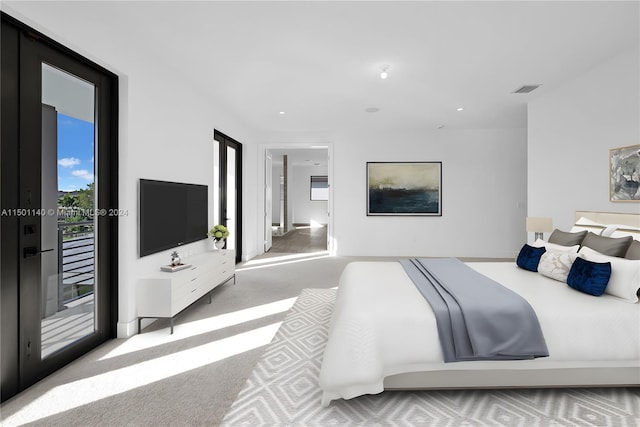 5735 SW 104th Ter, Cooper City, FL 33328 - carpeted bedroom featuring access to exterior and connected bathroom