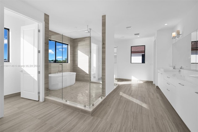 5735 SW 104th Ter, Cooper City, FL 33328 - bathroom with tile walls, shower with separate bathtub, tile floors, and vanity