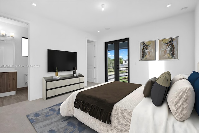 5735 SW 104th Ter, Cooper City, FL 33328 - carpeted bedroom with french doors, ensuite bathroom, and access to outside