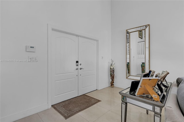 foyer with light tile floors