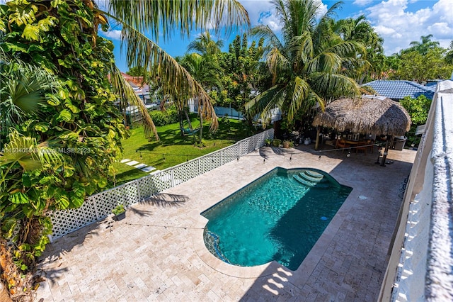 view of pool with a gazebo, a yard, and a patio area