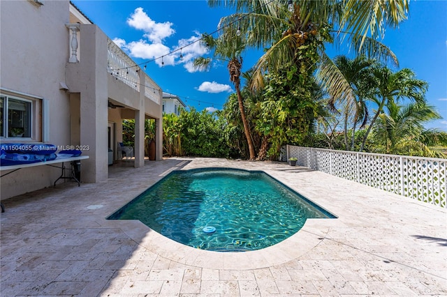 view of pool with a patio area