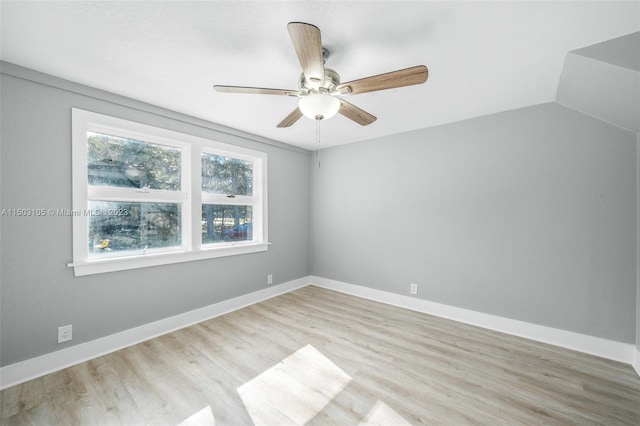 unfurnished room featuring ceiling fan, light hardwood / wood-style flooring, and plenty of natural light