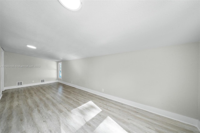 empty room featuring light wood-type flooring