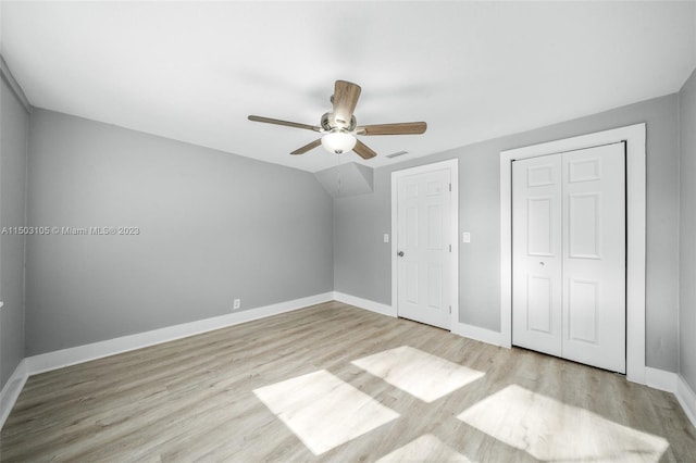 unfurnished bedroom featuring light wood-type flooring and ceiling fan