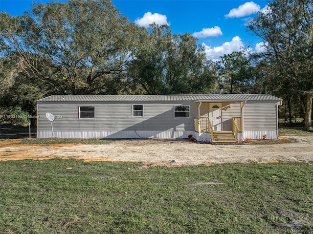 exterior space featuring a yard