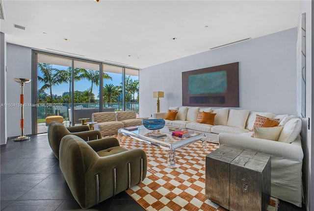 living room featuring a wall of windows