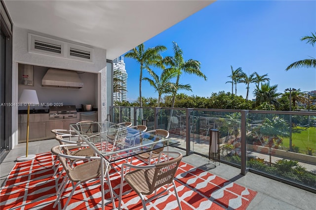 balcony featuring area for grilling and a grill