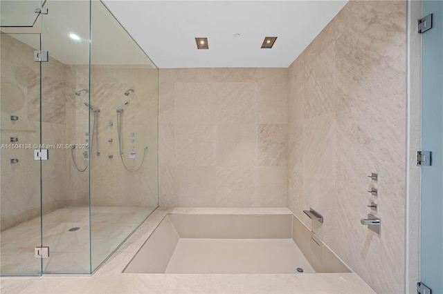 bathroom with an enclosed shower