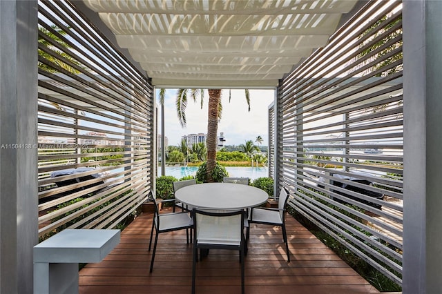 balcony featuring a water view