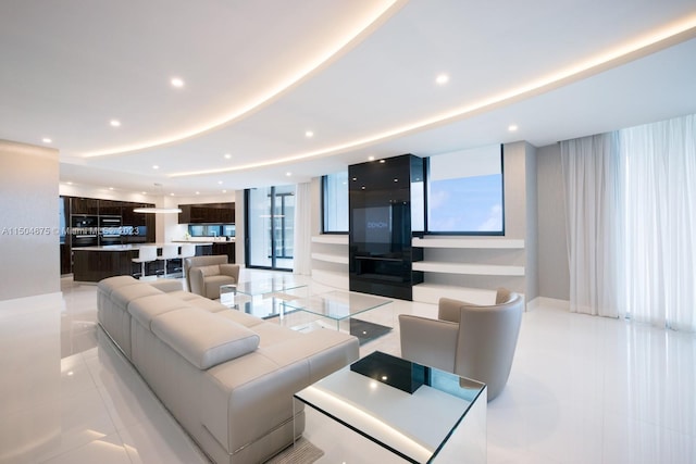 living room featuring light tile flooring