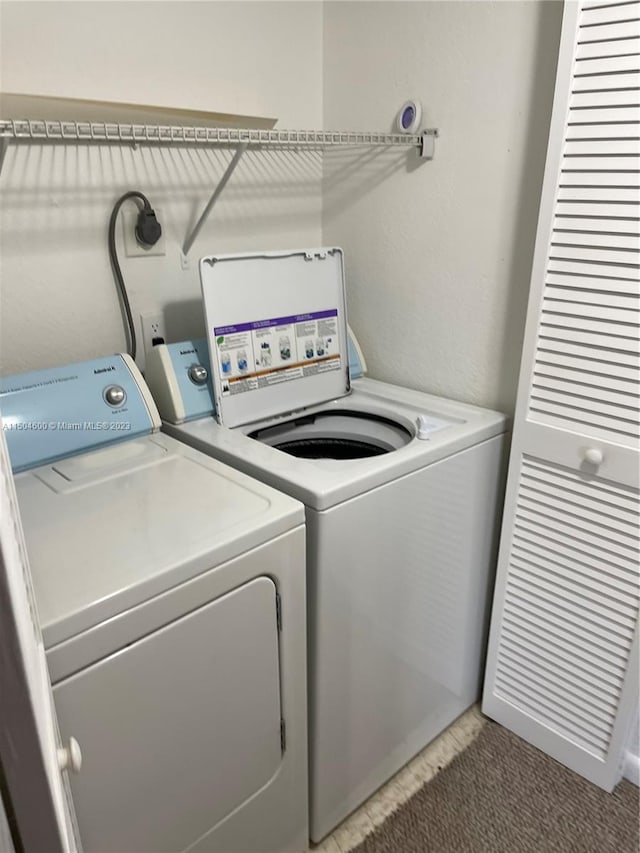 laundry area with washer and clothes dryer