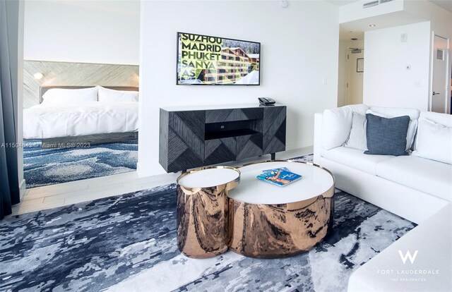 living room with wood-type flooring