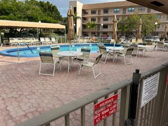 view of pool with a patio area