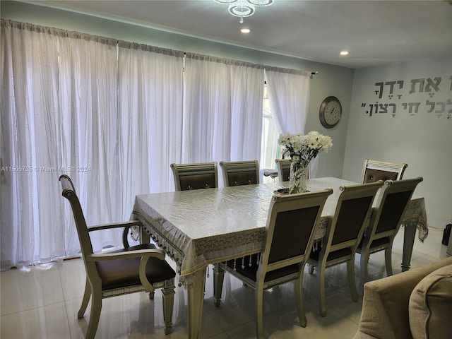 dining space featuring tile patterned flooring