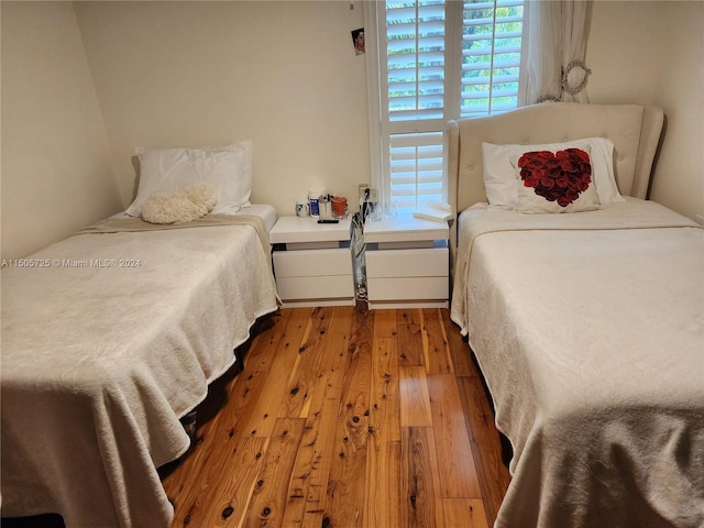 bedroom with wood-type flooring