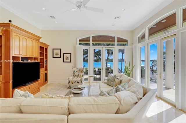 tiled living room with crown molding, french doors, a water view, and ceiling fan