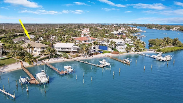 bird's eye view with a water view