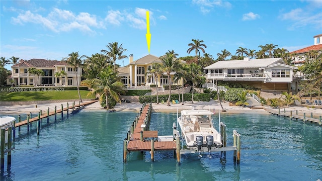 view of dock featuring a water view and a balcony