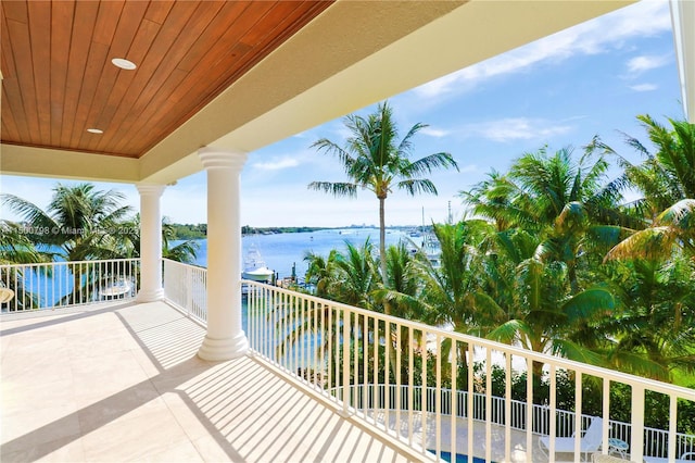 balcony featuring a water view