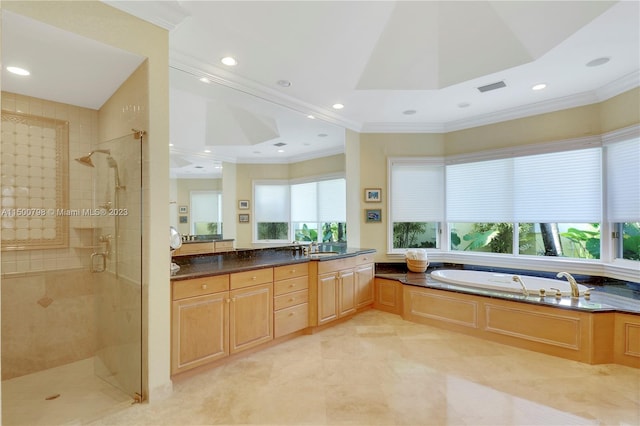 bathroom with plus walk in shower, tile floors, large vanity, and crown molding