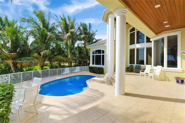 view of pool featuring a patio