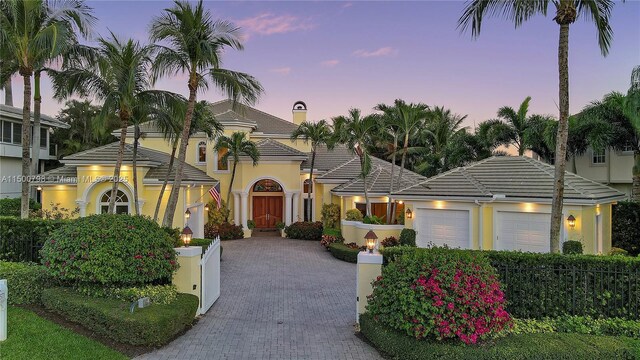 view of front of property with a garage