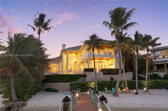 view of outdoor building at dusk