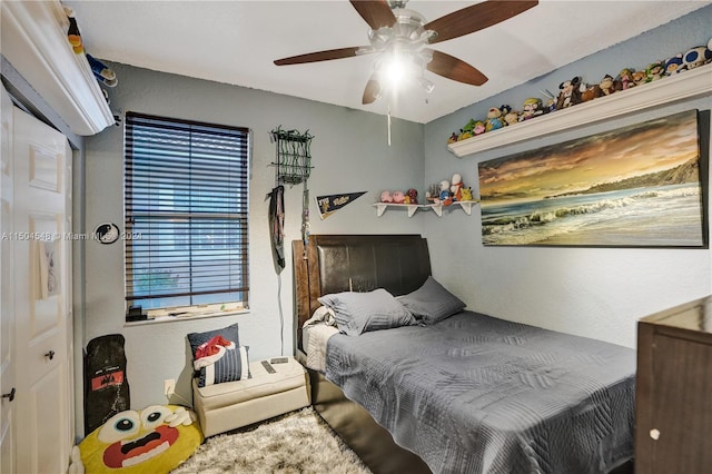 bedroom featuring a closet and ceiling fan