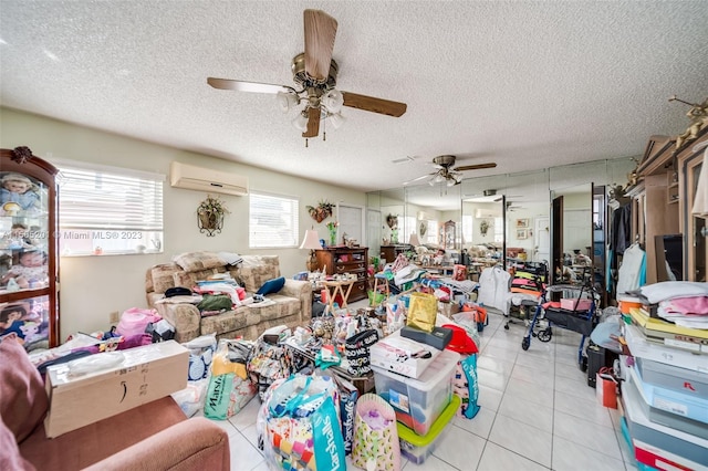 854 E 24th St, Hialeah, FL 33013 - misc room with a wall mounted air conditioner, a textured ceiling, a ceiling fan, and light tile patterned floors