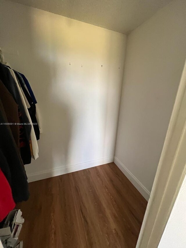 interior space with dark wood-type flooring